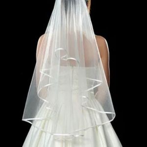 Two tier white or ivory veil with ribbon edging.